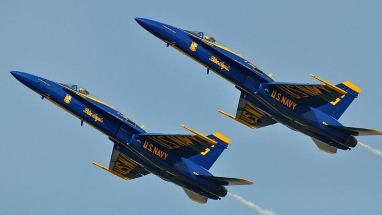 Hornet strike fighters from the U.S. Navy flight demonstration squadron, the Blue Angels, perform tight formation maneuvers during the Naval Air Station Patuxent River Air Expo Sept. 3.