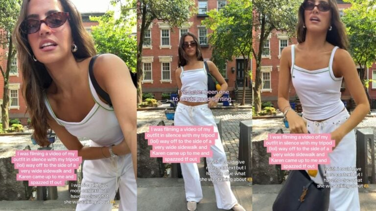 ‘You Guys Are Hurting Us’: New York Woman Interrupts Creator’s Outfit Video With Neighborhood Rant Woman posing on a sidewalk for an outfit video, wearing a white tank top and white pants.
