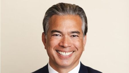 California Attorney General Rob Bonta’s office revised the official title of Proposition 39, a 2026 voter ID measure, replacing neutral wording with language that says it “prohibits citizens from voting” without ID. The change has fueled online debate.
