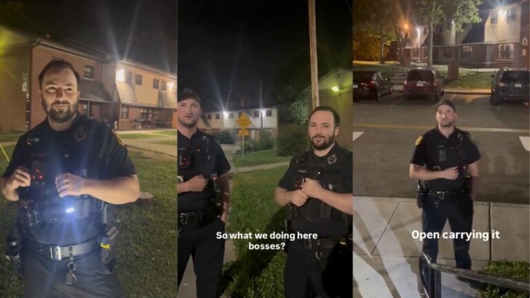 Nighttime video still showing Pennsylvania police officers questioning a group of men standing on a residential street after spotting a firearm.
