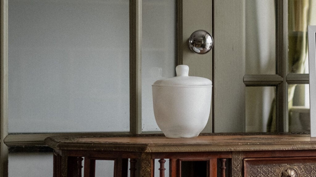 antique table with an urn