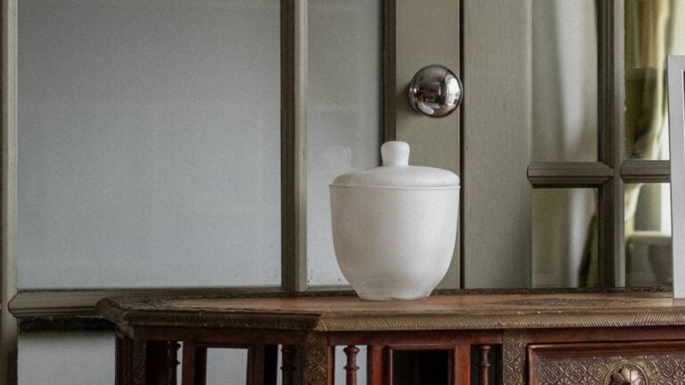 antique table with an urn