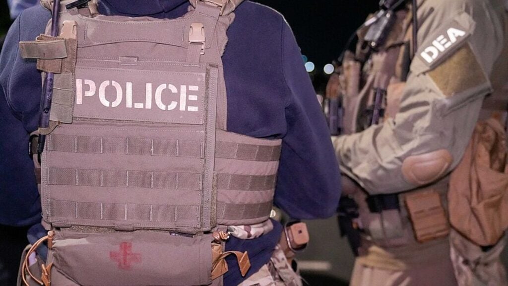 Texas Woman Threatens To Call ICE on Hispanic Family at Back-To-School Party: ‘Trump Has Poisoned America With Hate’ ICE and DEA law enforcement officials conduct a pre-dawn briefing prior to an enhanced immigration enforcement operation in a Washington, D.C. suburb on the morning of Feb. 4.