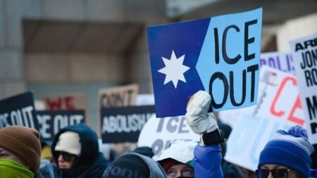 Backlash as Anti-ICE Demonstration in Washington DC Ends With Multiple Women in Handcuffs: ‘The First Amendment No Longer Exists’ Protest against ICE in downtown Minneapolis - ICE OUT flag sign.