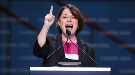 Minnesota Senator Faces Backlash After Celebrating Vote to Delay Federal Ban: ‘Billions in Fraud and Amy Klobuchar Concerns Herself with Hemp’ Minnesota Sen. Amy Klobuchar celebrated a Senate vote delaying a federal hemp ban, saying it protects local jobs. The post quickly drew sharp online replies questioning her priorities.