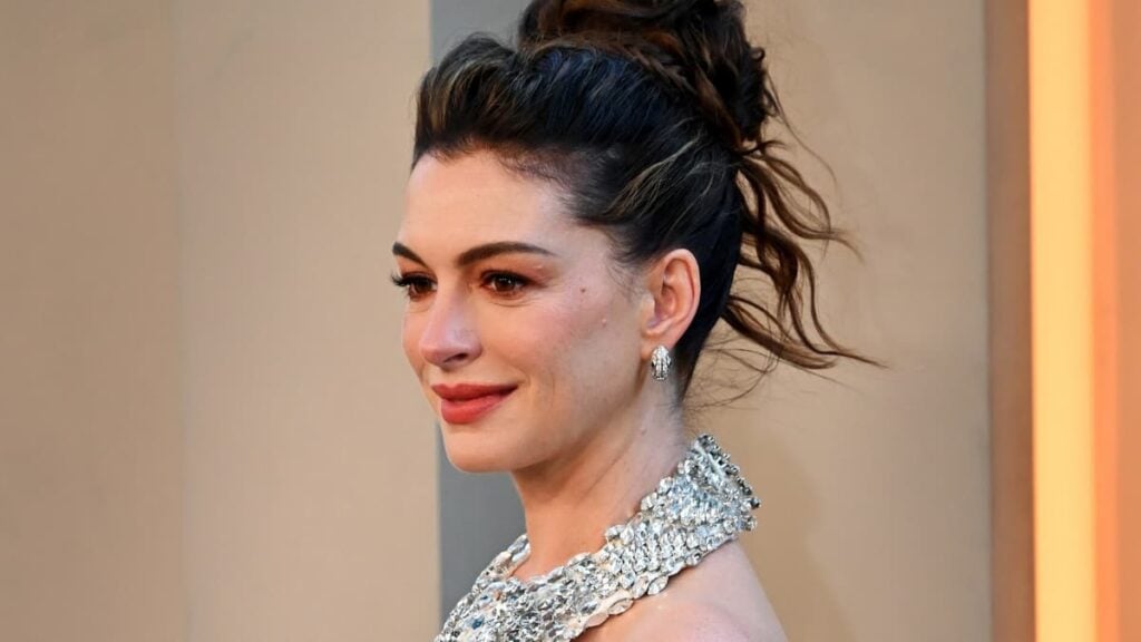 New York Actress Anne Hathaway Slammed After Showing Off Baby Bump at Premiere: ‘There Is No Class or Pride Hanging It Out Like That’ A picture of New York actress Anne Hathaway.