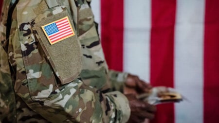 Upper half of a man wearing a US military uniform
