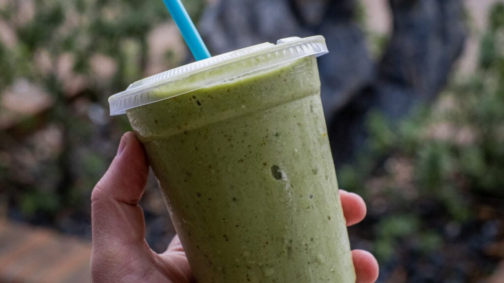 Missouri Woman Says DoorDash Driver Threw Her Drink at Her at Work: ‘That, Believe It or Not, Is Assault’ A person holding a green smoothie