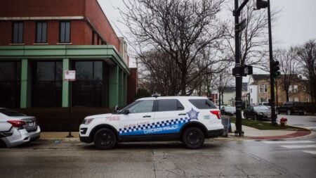 Off-Duty Illinois Cop Threatens Teens Before Confronting 13-Year-Old Hispanic Girl Filming on Sidewalk: ‘He Should Be in Jail for Child Abuse’ A Chicago police SUV parked on a city street near an intersection on a cloudy day.