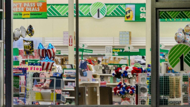 Florida Customer Says ‘Entitled Lady Expected Cashier to Pay for Her Items’ at Dollar Store: ‘The Confidence Was Honestly Impressive’ dollar store front at night with lights on inside