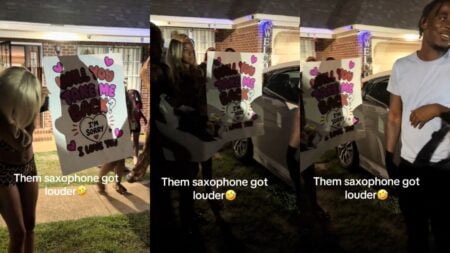 Mississippi Man Rejects Ex-Girlfriend’s Attempt to Win Him Back: ‘My Boy Said No Like 30 Times’ Woman holding a handmade "Will You Take Me Back" sign outside a house at night.