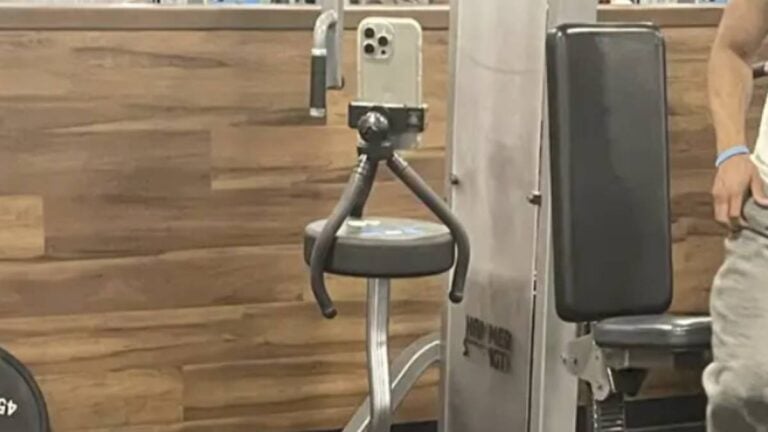 Gyms Have Gotten So Ridiculous That People Are Using Barbells as Tripods Now: ‘Just Use It With the Phone Hanging Off the End’ Gym Barbell Tripod Phone