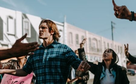 ‘What a Bunch of Clowns’: Liberals Mock Protestors After 22 Arrested During Anti-Islam Demonstration in Wayne County, Michigan A man protesting against something.