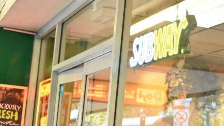 Subway restaurant exterior with illuminated sign