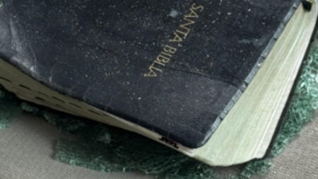 Bible and Broken Glass Left Behind After Seattle ICE Arrest Resident Says