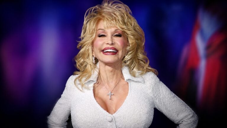 Tennessee icon Dolly Parton smiling on stage as tributes pour in