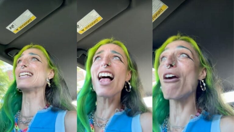 Green-Haired Ohio Woman Says She Wants a Man to ‘Handle It,’ Gets Told Exactly What She Feared: ‘First of All, Calm Down’ Screenshot of a green-haired Ohio woman speaking emotionally inside her car in a viral TikTok video.