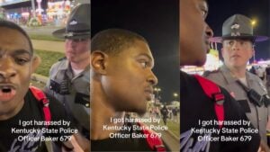 A Kentucky state trooper identified as Officer Baker detains a man at a public fair during a recorded confrontation over a disorderly conduct charge.