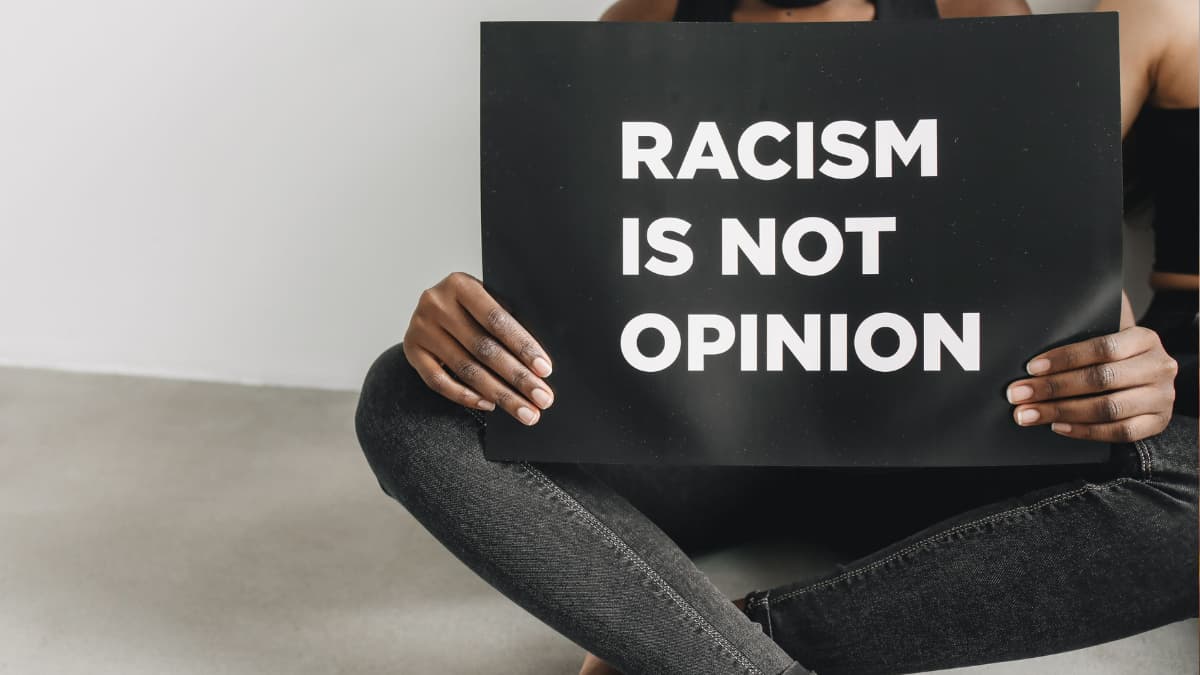 Racist White Illinois Students Make Monkey Gestures Toward Black Crowd: ‘This Is Learned Behavior’