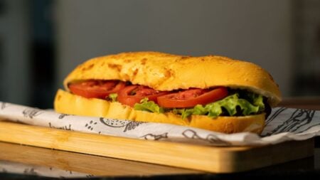 ‘Because I Don’t Feel Like It’: Georgia Customer Says Jimmy John’s Worker Refuses to Make Him a Sandwich Sub sandwich with fresh tomatoes and lettuce on a wooden board.