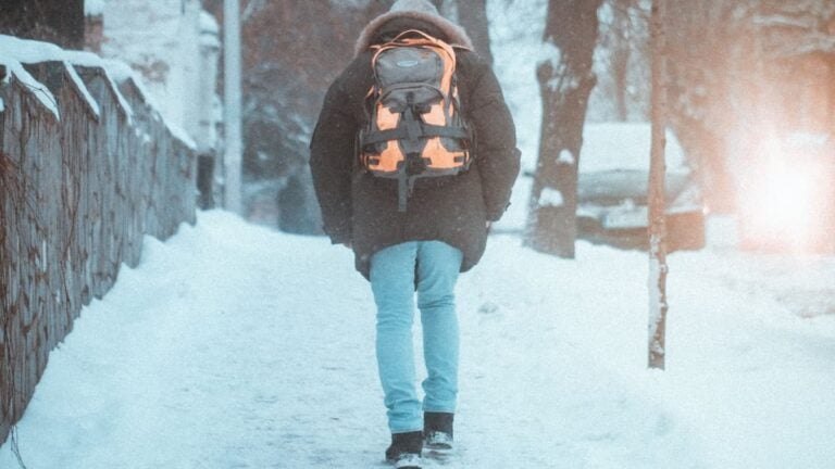 ‘Kids Walking a Mile in the Dark Through the Winter?’: Indiana Locals Fear the Worst as School District Expands No-Bus Zones Amid $3.8M in Cuts Kid walking in snow