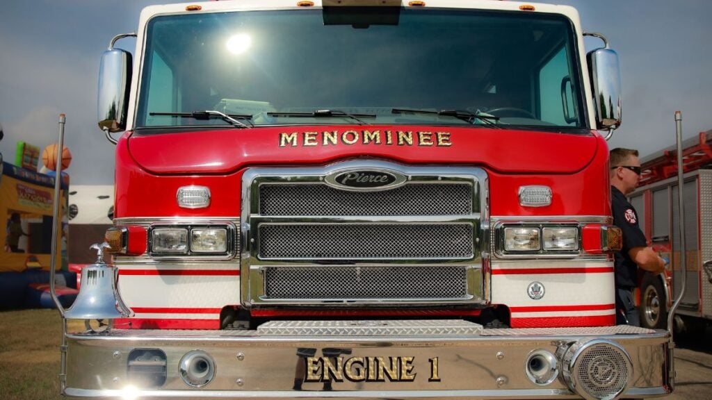 ‘Bro, I’d Cancel Your Membership’: Nevada Gym-Goer’s Fire Marshal Report Sparks Debate Close-up of a Menominee fire engine truck with red livery, parked outdoors.