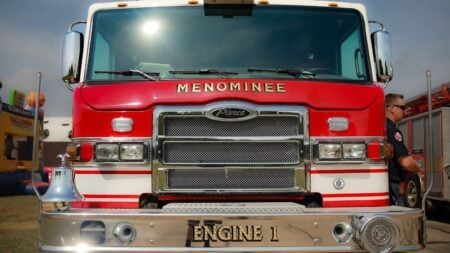 ‘Bro, I’d Cancel Your Membership’: Nevada Gym-Goer’s Fire Marshal Report Sparks Debate Close-up of a Menominee fire engine truck with red livery, parked outdoors.