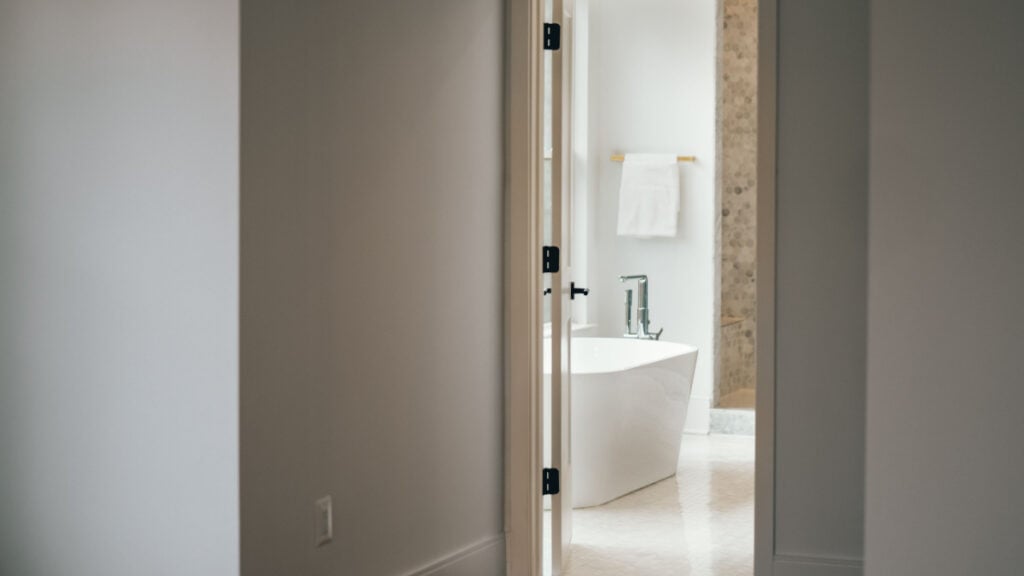 Louisiana Tenant Says They’ve Been Locked Out of Their Bathroom in Their Own Apartment: ‘I Wouldn’t Expect Much Help From the Landlord’ A glimpse into a modern bathroom with a sleek bathtub