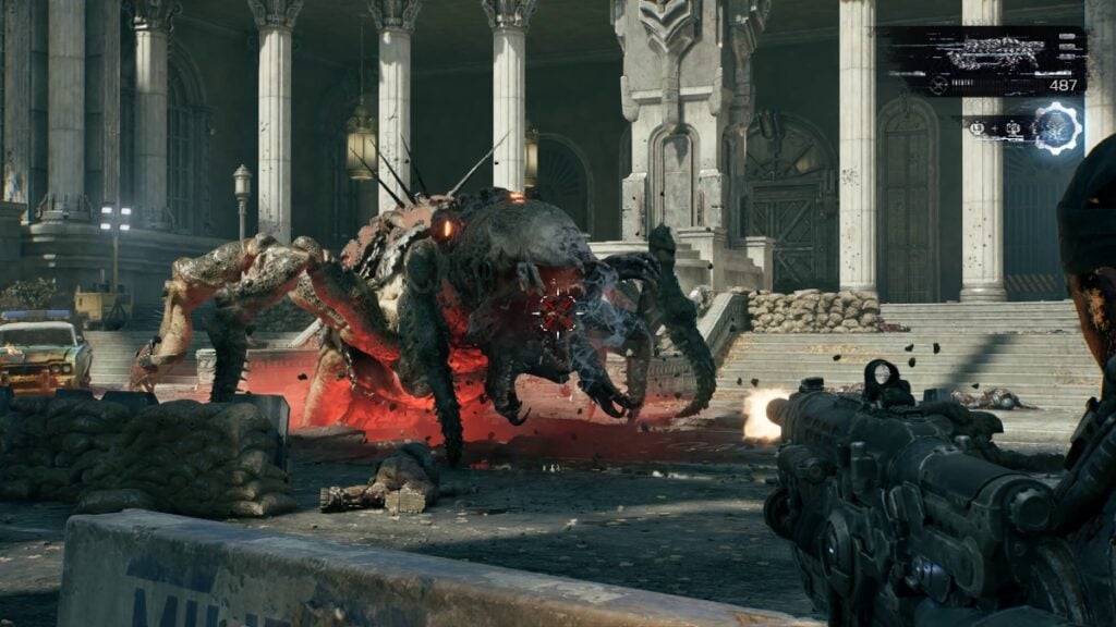 Marcus shooting a Locust enemy