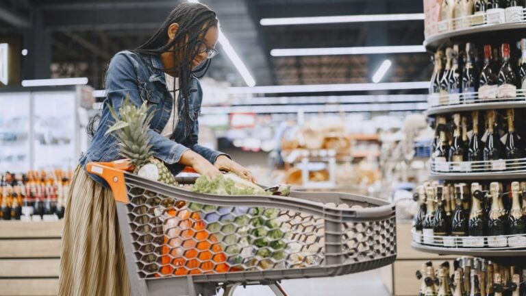 North Carolina ‘MAGA Grandpa’ Verbally Attacks Black Woman While She Shops for Groceries: ‘You Blacks Think You Own the World’ An adult woman shopping for fresh produce in a modern supermarket setting.