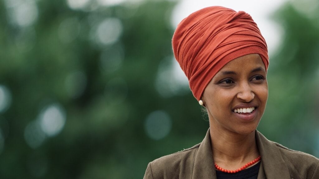 Federal agents searched Minnesota Rep. Ilhan Omar’s Washington, D.C.-area home Monday as part of a criminal investigation, according to people familiar with the matter. Online reactions split between calls for accountability and concerns about timing.