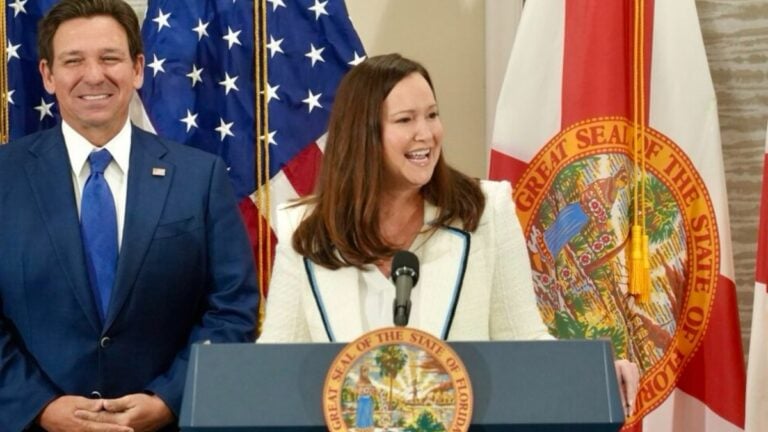 Florida Sen. Ashley Moody posted a campaign video on X claiming she delivered the largest tax cuts in history, including no taxes on tips or Social Security. The post drew replies questioning the temporary nature of the measures.
