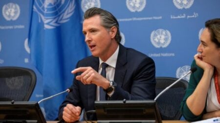 California Governor Gavin Newsom posted that the state has added more than $1.5 trillion to its economy since 2019 and leads in next-generation industries. The X post, including a clip from a Long Beach summit, drew thousands of replies.