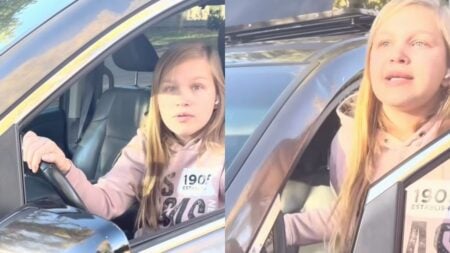 Oregon Woman Hurls Racist Slurs at Hispanic Drivers During Roadside Dispute: ‘So Young and So Filled With Hate’ Screenshot of a young blonde woman in a pink hoodie sitting in her car during a roadside dispute in Oregon.