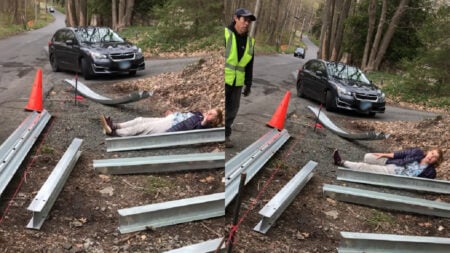 Connecticut Homeowner Lies in the Road to Stop Crew From Installing Guardrail: ‘I Can’t Sit on My Property?’ Connecticut-Homeowner-Protests-Guardrail-Being-Constructed-Over-Property-Dispute
