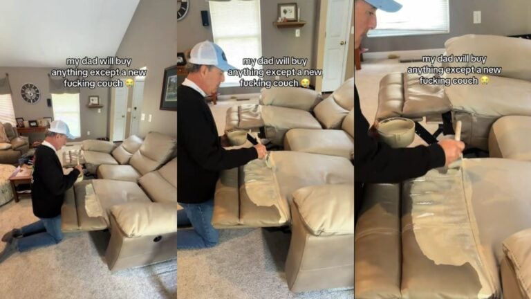 Man sits on knees painting couch.