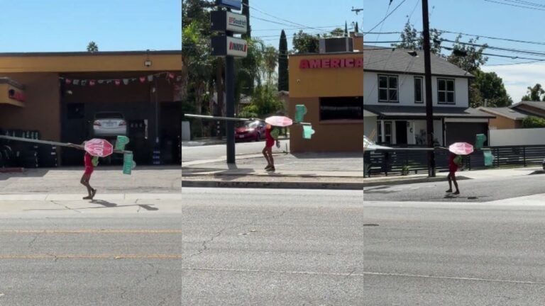 ‘That’s One Way to Change Your Address’: California Woman Seemingly Caught Walking Away With Street Signs Woman walking down the street carrying stop sign.