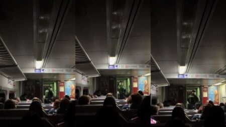 Inside of a stopped subway car.