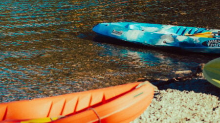 ‘The Government Is Not Going to Investigate Their Own Mistake’: Wisconsin Homeowner Says County Marked Private Driveway as Public Boat Launch Without Permission Kayaks beside a river