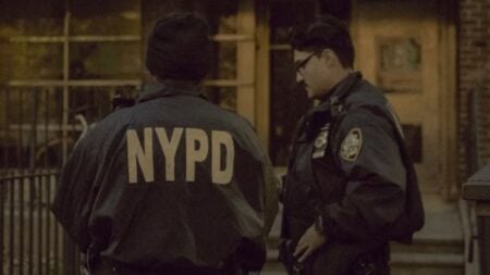 New York Men Aren’t Happy After NYPD Officer Exchanges Numbers With Woman: ‘He’s Supposed to Be Serving and Protecting’ Two NYPD officers on duty in New York City, emphasizing urban safety.