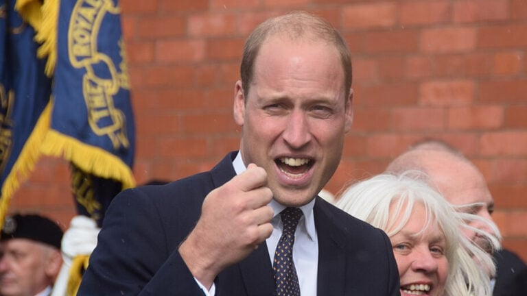 ‘So He Wants to Help the Homeless by Making More People Homeless?’: Prince William Faces Outrage Over Estate Sale in England Prince William Smiling with tea sipping hand gesture