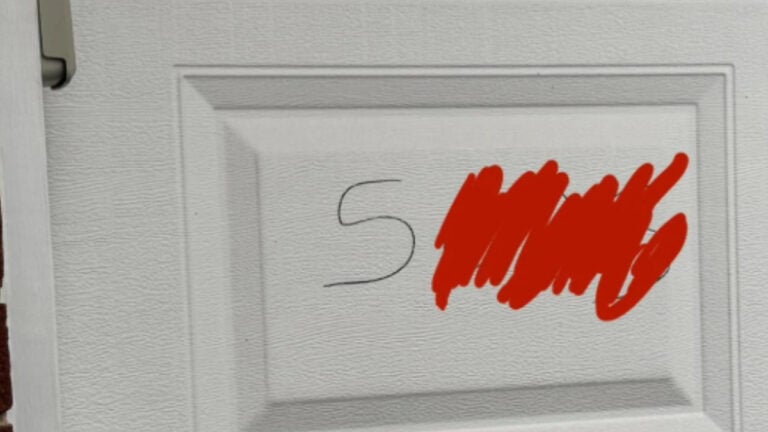 Dallas Resident Says Delivery Man Vandalized Their Garage Door